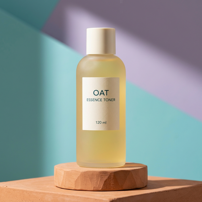 Yellow essence toner bottle on a colorful studio pedestal